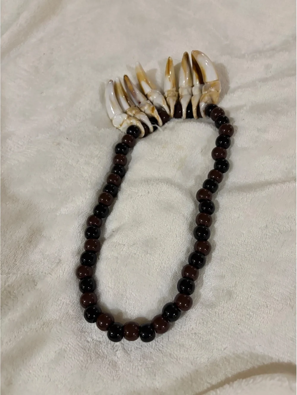 Amscan brand Witch Doctor necklace brown with elephant tusks